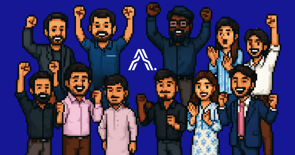A pixel art illustration featuring ten male and three female team members cheering with their fists raised in celebration. The company logo (stylized 'A') is centered behind them against a bright blue background. This image conveys a vibrant, united, and energetic team culture.