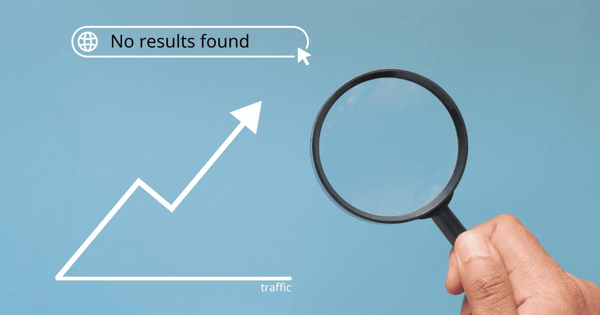 Hand holding a magnifying glass with an upward trending traffic graph and a 'No results found' search bar on a blue background. Represents the potential for increasing traffic by targeting zero search volume keywords.